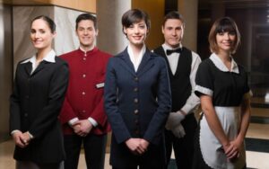 Hotel staff standing together and smiling